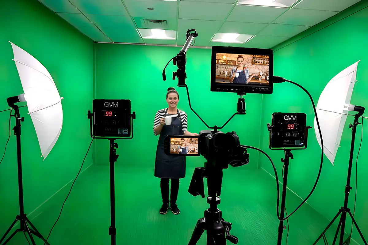 Inside our Connecticut Website Company green-screen studio in Southington — full lighting, broadcast camera, and live monitoring
